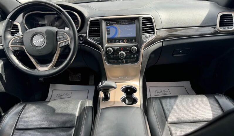 
								2014 JEEP GRAND CHEROKEE OVERLAND fully loaded clean title full									