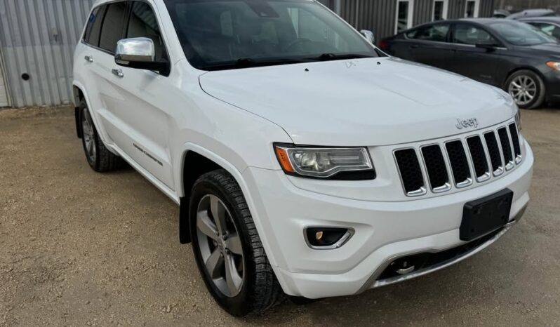 
								2014 JEEP GRAND CHEROKEE OVERLAND fully loaded clean title full									